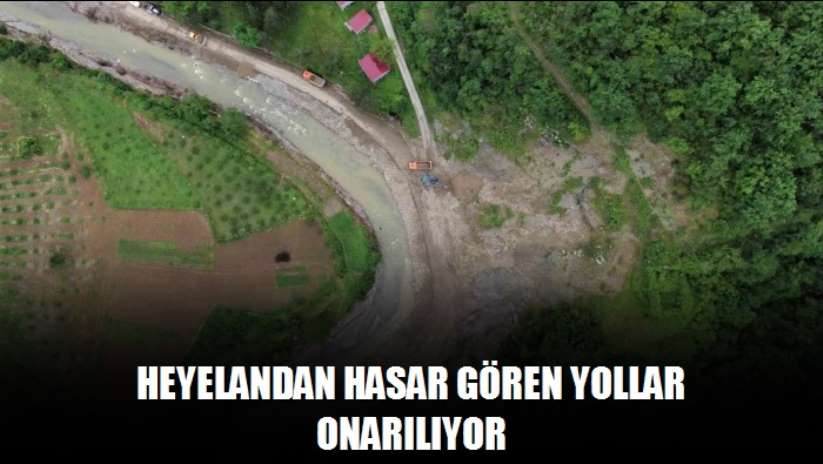 Heyelandan hasar gören yollar onarılıyor