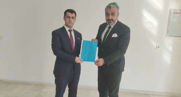 MHP'li Özbek mazbatasını aldı 